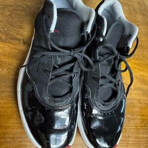 Jordan Black Sneakers with Patent Leather Accents and White Sole